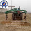 tractor tree planting earth auger digging hole machine